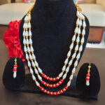 Triple String Drop Shaped Pearls Necklace