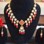 Kundan Necklace with Red Meenakari Pendant